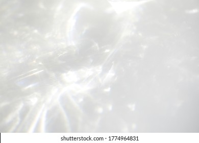 Blurred Overlay Effect For Photo And Mockups. Wall Texture With Organic Drop Diagonal Shadow And Rays Of Light On A White Wall. Shadows For Natural Light Effects