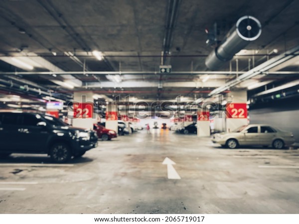 blurred
parking garage with car wallpaper
background