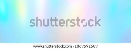 Blurred pastel multicolored background from lights. Iridescent holographic abstract aurora light neon colors backdrop. banner