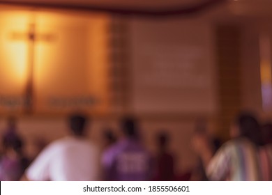 blurred of a pastor prays for people in a small christian local church ,Asian people go to church for Sunday prayers,many people are worship to God. - Shutterstock ID 1855506601
