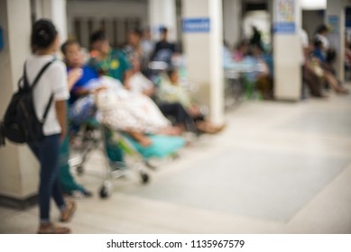 Blurred of patient on wheelchairs waiting for treatment in  the hospital. - Shutterstock ID 1135967579