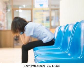 Blurred Patients In Doctors Waiting Room