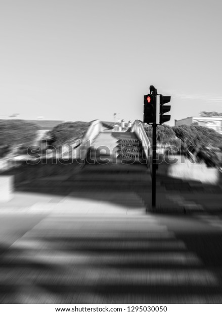 Blurred pedestrian cross\
walk