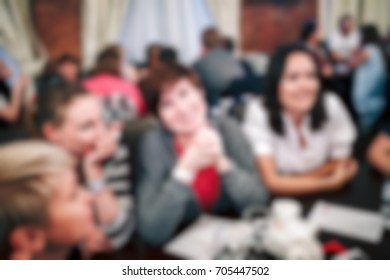 Blurred People In The Banquet Room With Gala Dinner.