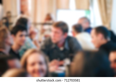 Blurred People In The Banquet Room With Gala Dinner.