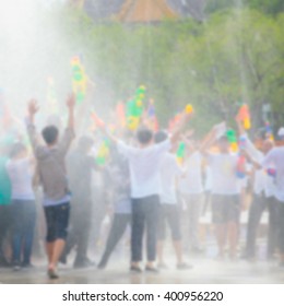  Blurred People playing in water - Songkran Festival in Thailand