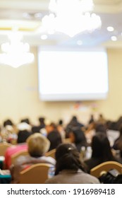 Blurred people sitting in business seminar room in hotel business background