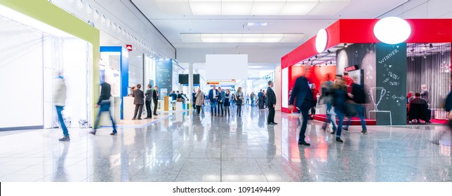 Blurred People At A Trade Fair Hall