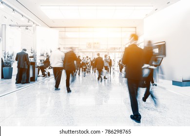 blurred people at a trade fair hall - Shutterstock ID 786298765