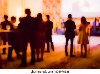 Blurred People And Waiter On Gala Dinner Party In Ballroom