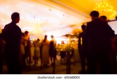 Blurred People And Waiter On Gala Dinner Party In Ballroom