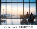 blurred people waiting for the flight departure in airport. Defocused image of an airport.