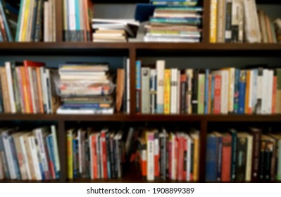 Blurred photo of the arrangement of books on the shelf