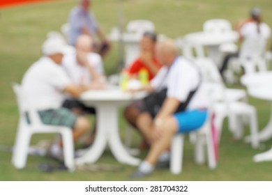 Blurred Photo Of Audience Take A Rest After Finished Match In Golf Tournament.