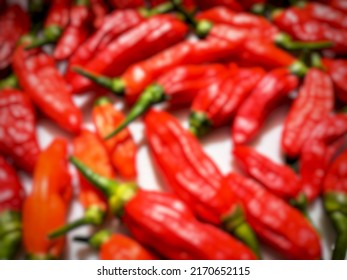 Blurred Photo Of Capsicum Frutescens Or Siling Labuyo On White Background.