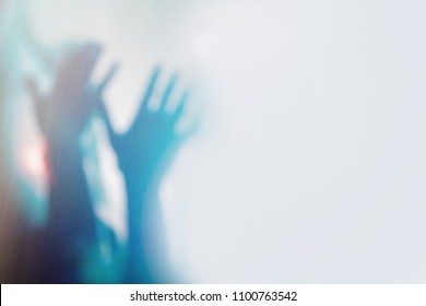 Blurred Photo Of Christian Worship God Together In Church Hall In Front Of Music Stage.raised Hand And Praise The LORD.Music Concert Background.