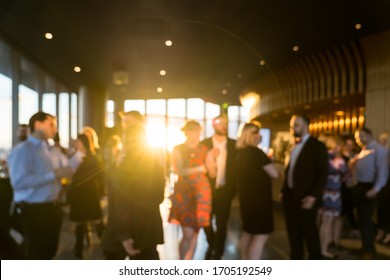 Blurred photo Crowd of unrecognizable business people standing and talking together in exhibition event at conference hall, meeting and seminar, lifestyle and leisure, celebration and party concept