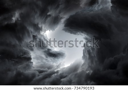 Blurred Photo of Tunnel in the Dark and Dramatic Clouds