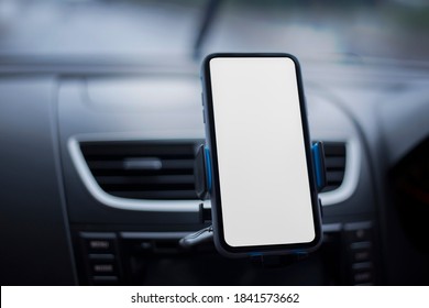 Blurred photo Where the mobile phone is placed in front of the car to view the map instead of google map