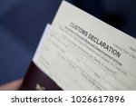 a blurred photos of customs declaration 