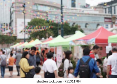 Blurred Photo,the Outdoor Winter Fun Science Fair With Many People/crowd In The City