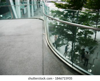 Blurred Picture Of Curved Laminated Glass. 