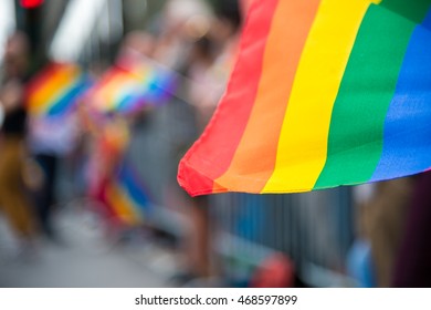 Blurred Picture Of A Gay Rainbow Flag At A Pride Parade