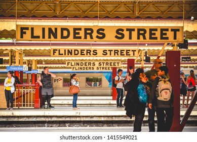 A Blurred Picture Of Many Passengers Are Waiting At Platform For Metro Train At Flinders Street Metro Station, Melbourne, Australia, October 2018 