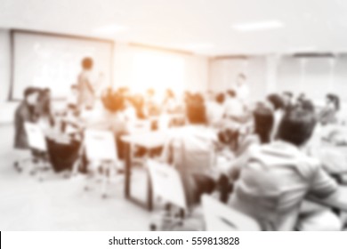 Blurred Picture Of Student During Study Or Exams From Teacher,professor In Classroom At University. Abstract Background People Learning,testing,training Group. Lecture,meeting About Education.