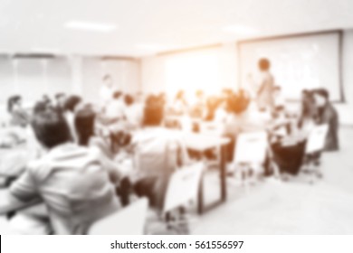 Blurred Picture Of Student During Study Or Exams From Teacher,professor In Classroom At University. Abstract Background People Learning,testing,training Group. Lecture,meeting About Education.