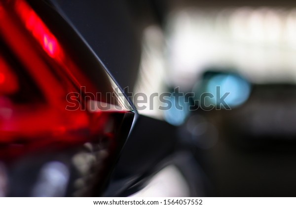 blurred picture of tail light car,Soft focus red\
tail light on the car.