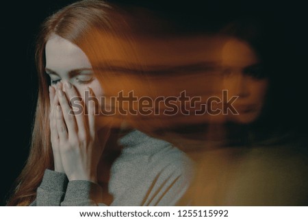 Similar – Image, Stock Photo Black woman covering her eyes with her hands.