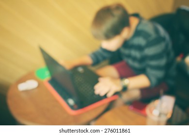 Blurred of playing on computer notebook