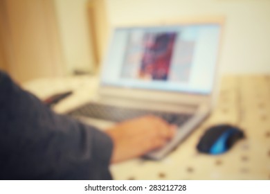 Blurred of playing on computer notebook