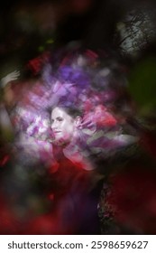 Blurred Pose between projected textures of heat and peonies.