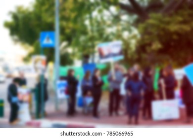 Blurred protesting crowd