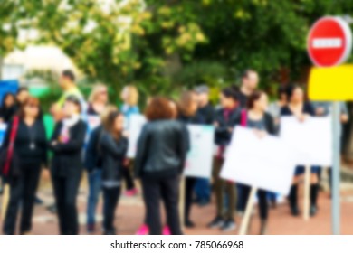 Blurred protesting crowd