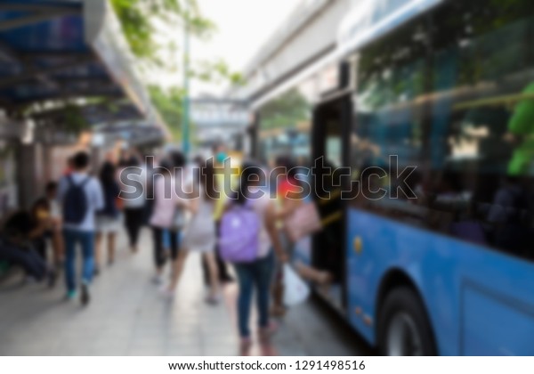 Blurred Public transport bus at bus stop BTS mo\
chit in Chatuchak Bangkok,\
Thailand