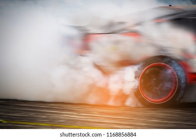 Blurred Race car drifting on speed track on twilight background.