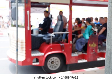 Blurred Red Bus Full Of Tourists Passengers To Travel Site Seeing 