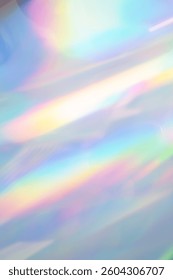 Blurred refraction light texture overlay effect. Holographic rainbow background.