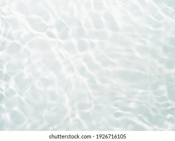 Blurred ripple water texture white background  Shadow water sunlight  Mockup for product  spa travel background  Marble water surface as wallpaper background