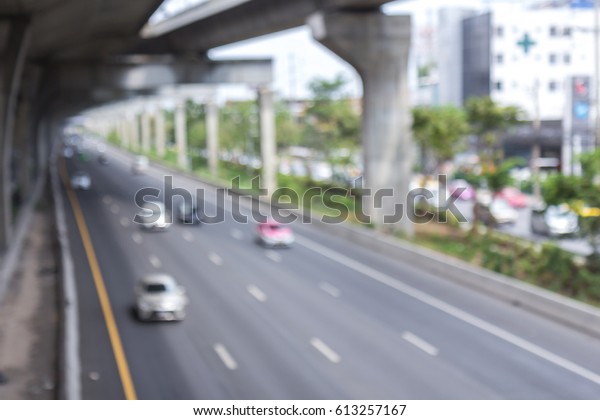Blurred road with car running,blurred image car\
running on road
