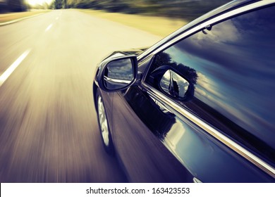 Blurred road and car, speed motion background - Powered by Shutterstock