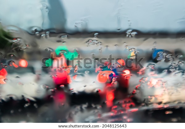 Blurred, Rush hour after work, Cars\
stuck and traffic jam in the rain Bangkok\
Thailand