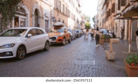 Blurred scene in rome featuring cobblestone street, historic architecture, parked cars, with out-of-focus pedestrians adding a lively atmosphere to the italian cityscape. - Powered by Shutterstock