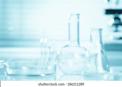 Blurred Science Background, Test Tubes And Microscope, Research Concept