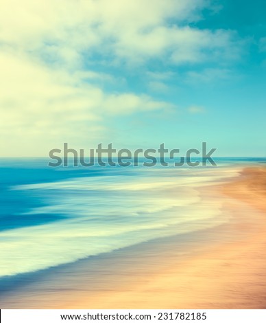 A blurred seascape abstract made with panning motion and long exposure.  Image displays soft, pastel colors in a retro style.