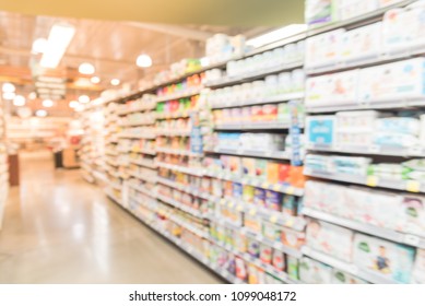 Blurred Selection Of Probiotics, Multi Vitamins, Bone & Joints, Baby Care In Store. Defocused Background Aisles, Rows, Shelves Variety Products In Supermarket At Dallas, Texas, USA