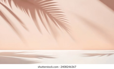 Blurred shadow from palm leaves on the light pink wall. Minimal abstract background for product presentation. Spring and summer. Peach Fuzz Color of the year 2024.